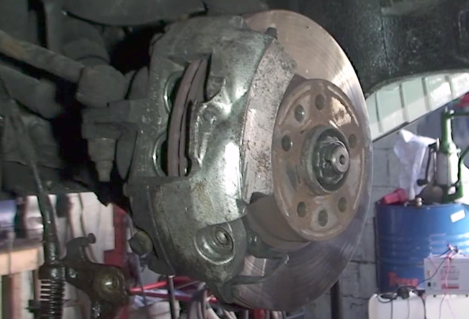 Showing two of the four pistons in the front caliper.